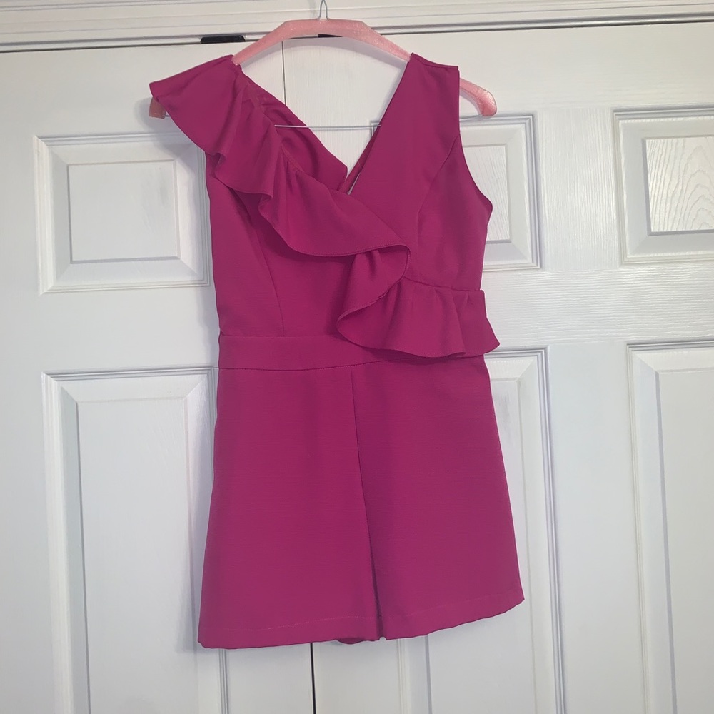 Pink ruffle romper. NWOT